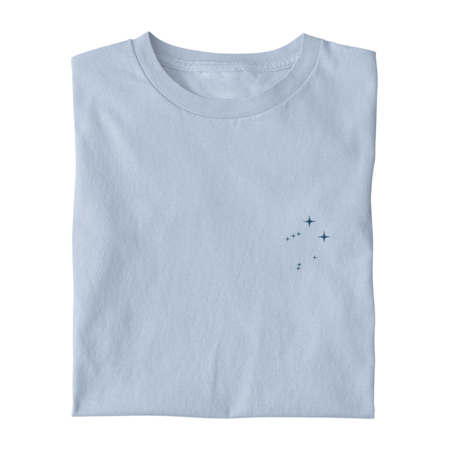 Folded  t-shirt with the Libra constellation design on a white background.