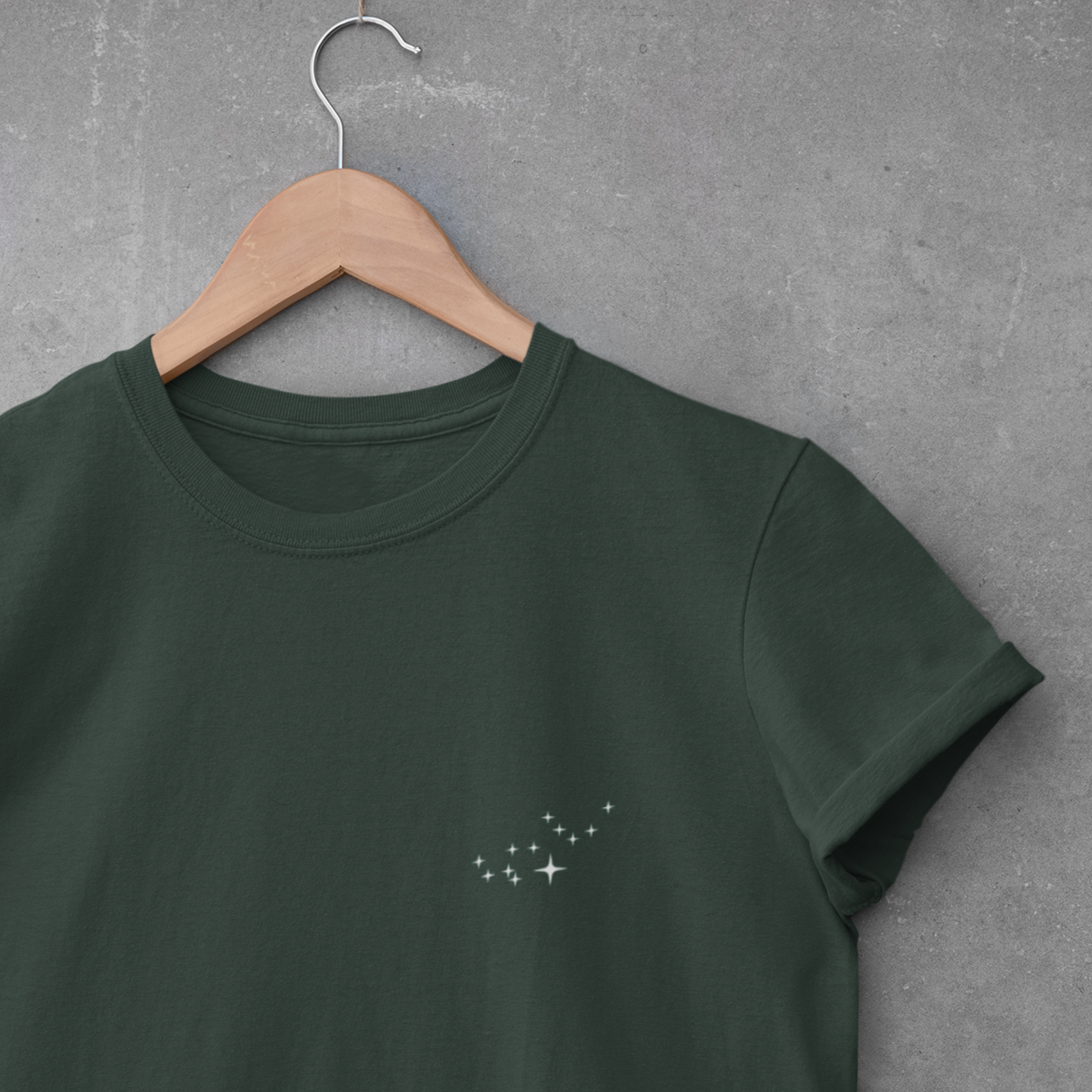 Virgo constellation t-shirt on a hanger against a gray background